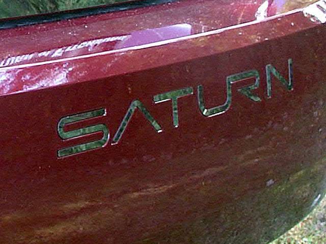SATURN ION 4dr QAA Stainless 5pcs Graphic/Logo/emblem SGR45410